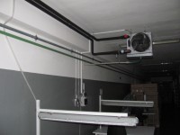 Dodávky a montáž vykurovania a chladenia 2 výrobných hál (9 ks teplovodný ohrievač/chladič vzduchu)